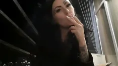 Play Dominatrix nika sexy in the evening on her balcony and blows in your face.